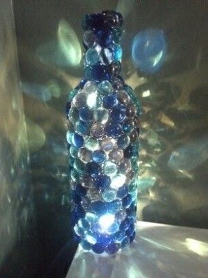Homemade Nightlight (wine bottle, glass gems, christmas lights) This is a great