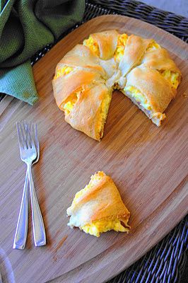 Lazy Saturday Breakfast = bacon, egg, and cheese wrapped in crescent roll dough.