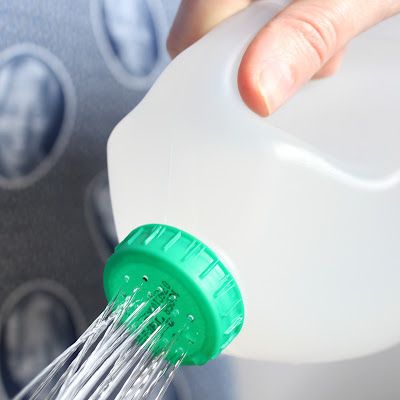 Milk jug watering can – no drips.  This would be great for the kids when they &q