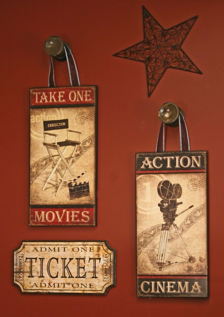 Movie room. Movie signs look awesome hanging from our large wood knobs!