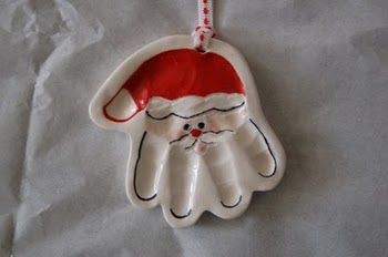 OMG this is sooo cute! Santa ornament with kids' hands, what a cute gift ide
