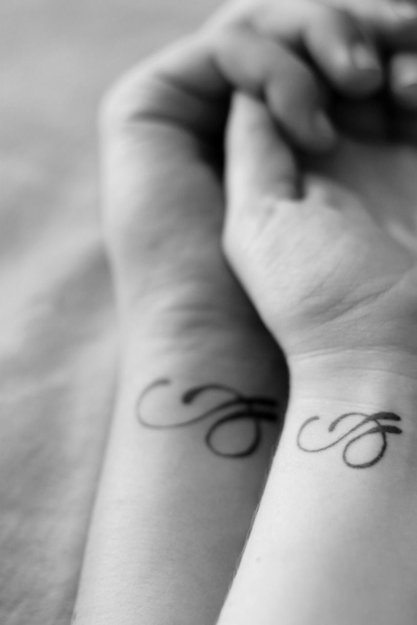 Our couples tattoo. The design is the first letters of our names intertwined (e