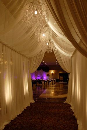 Pipe and drape hallway: such an elegant entrance!