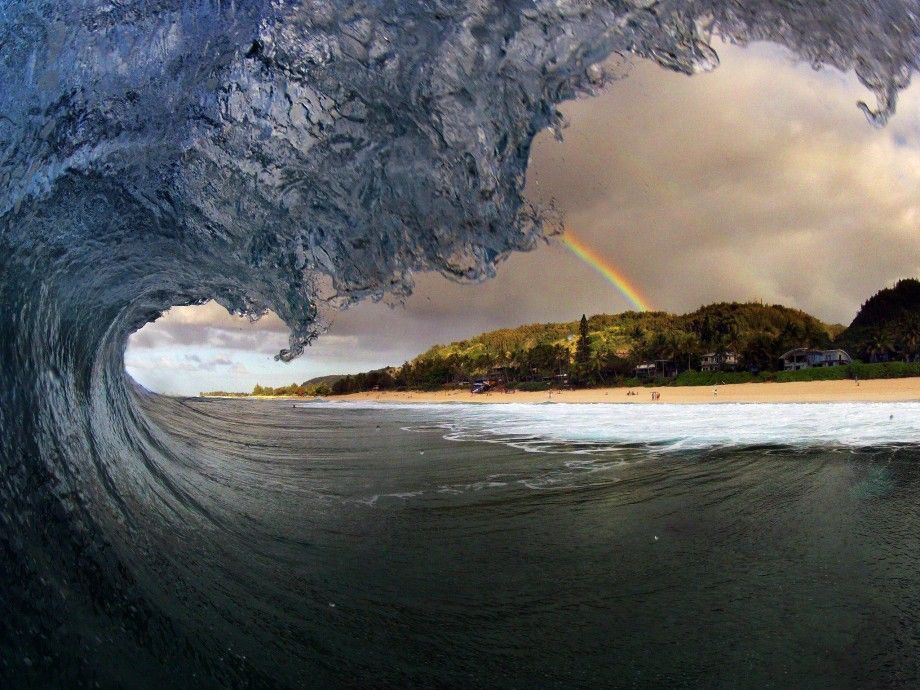 Rainbow through a barrel in Hawaii