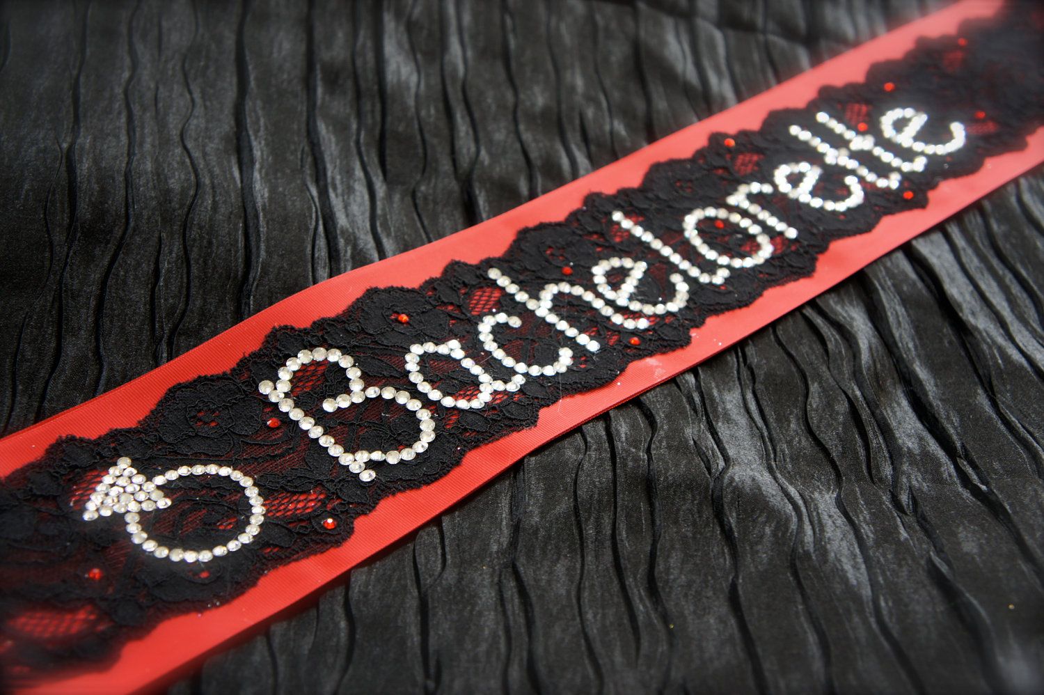 Red and Black Lace Rhinestone Bachelorette Sash. $84.00, via Etsy.