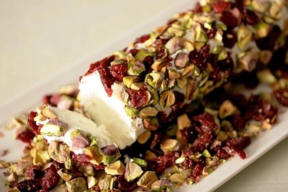 Thanksgiving appetizer. Goat cheese log with cranberries and pistachios