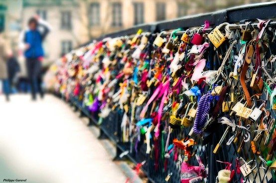 The Lover's Bridge in Paris. Couples attach a padlock to the bridge and thro