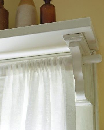 The curtains were sewn with a loop that slips over the dowel, and the shelf on t