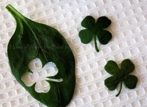 Use a craft punch. (Four leaf clovers out of spinach for topping dishes on St. P