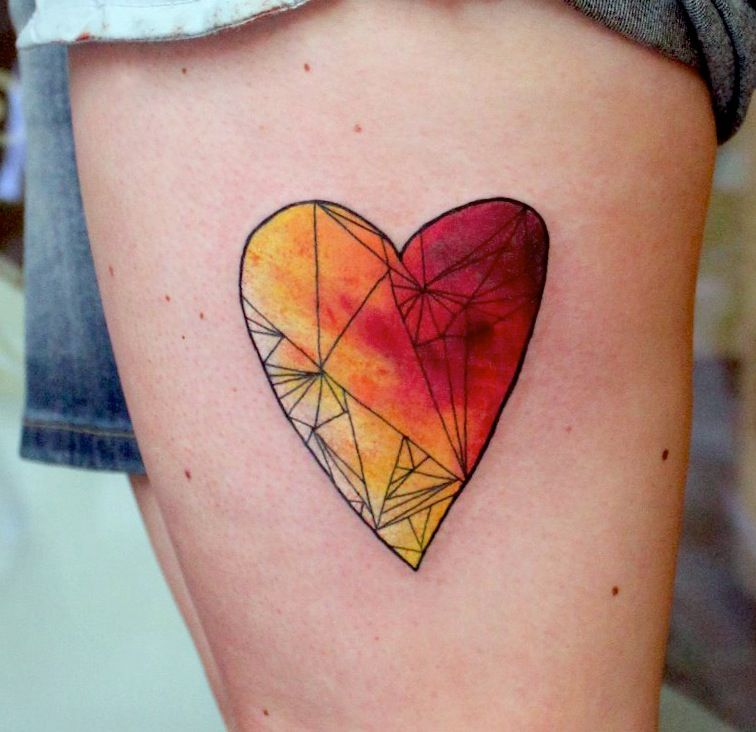 Watercolory heart tattoo by Lukasz Bam Kaczmarek in Krakow, Poland