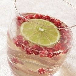 Winter White Sangria with Pomegranate and Lime…perfect for a holiday party. Wh