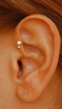 Ear head piercing -   Ear head piercing