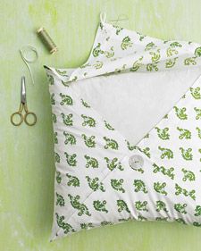 easy fabric into pillows – tack 3 corners together with the button and 1 corner