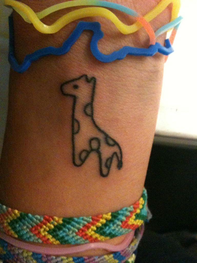 giraffe wrist tattoo