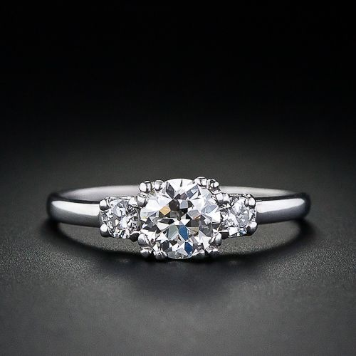 love this simple, classic, dainty three stone setting