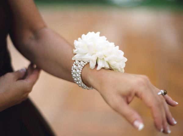 mom and grandma corsage: modern corsage: pearl bracelet with one big bloom. I lo
