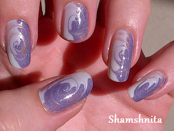 swirled nails – 2 polishes and a dotting tool.