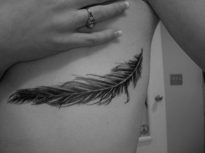 #tattoo #feather #ribs