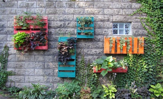 upcycle tip: turn unwanted wood pallets into fabulous planters, painted w/ brigh