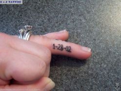wedding finger tattoo
