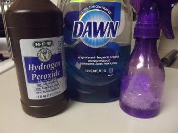2 part hydrogen peroxide to 1 part Dawn (original blue) will take the stains out