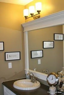 $30 to frame the mirror. This site has lots of ideas on changing up your home fo