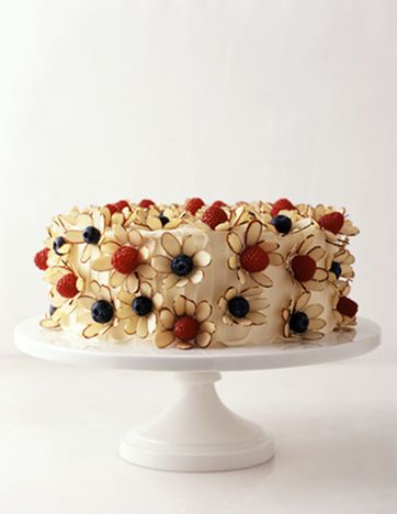 Almond slivers with raspberries and blueberries as flowers.