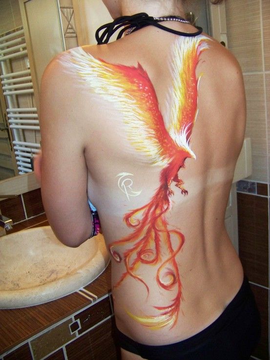 Beautiful phoenix tattoo. I really love tattoos that don't have a black outl