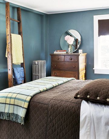 Blue-Green Bedroom  Deep blue-green walls are offset by chocolate brown bedding