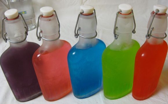Chilled Jolly Ranchers Vodka in flasks