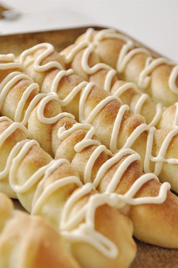 Cinnamon sugar breadsticks with cream cheese drizzle.