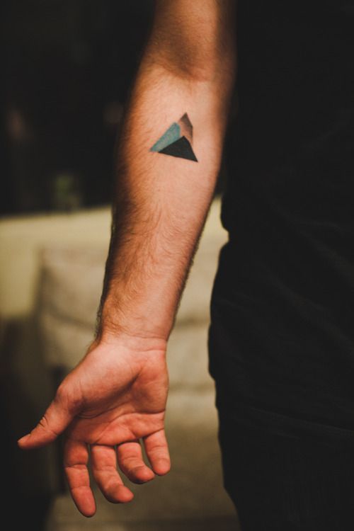 Colored mountain tattoo on the arm