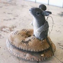 Cross stitching mouse pincushion