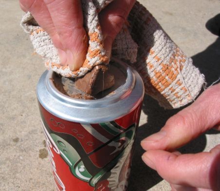 Did you know you can make a fire by using a can of soda and a chocolate bar?