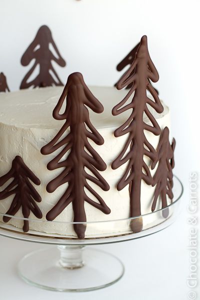 Draw Christmas trees on parchment paper using melted chocolate. Place in frig to
