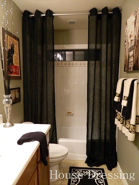 Floor-to-ceiling shower curtains…make a small bathroom feel more luxurious. ..