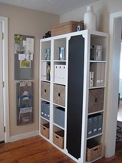 Great idea for IKEA Expedit shelves. Turn one around and paint chalkboard on the