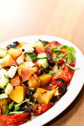 Grilled Tomato and Peach Salad! This sounds wonderful on a hot summer day!