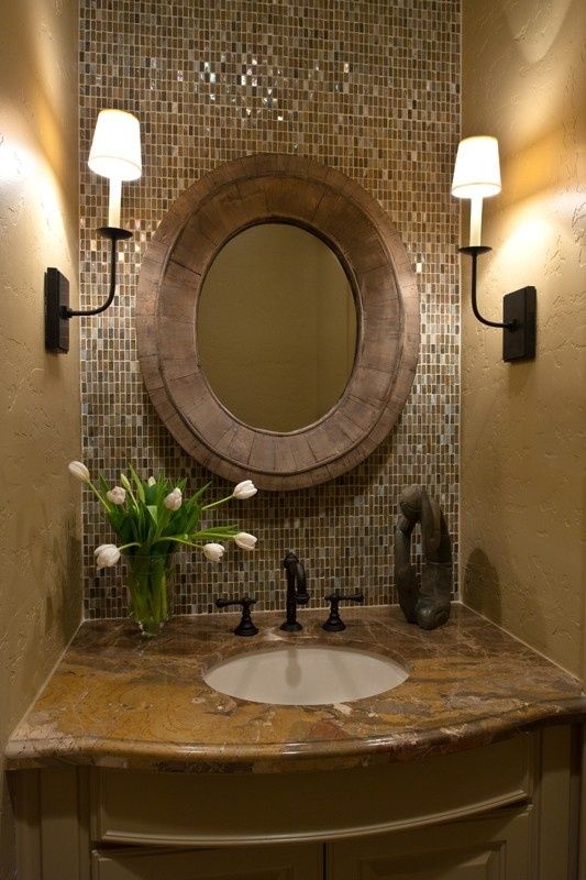Half bath….Take backsplash tile in the bathroom all the way up to the ceiling.