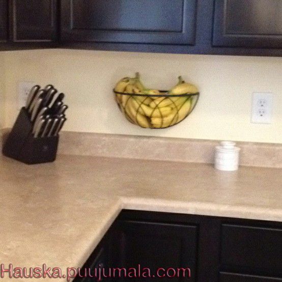 Hanging planter basket re-purposed as a fruit holder! Frees up valuable counter
