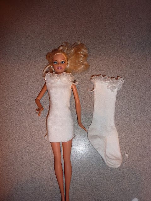 I came up with this idea for our naked barbies.  It is so easy and solves my kid