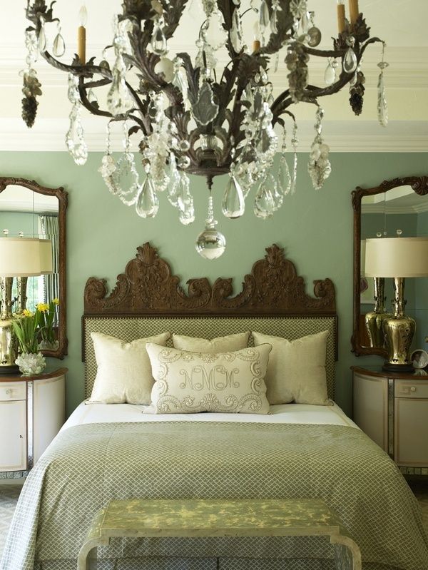 Mirrors above nightstands makes the room look bigger