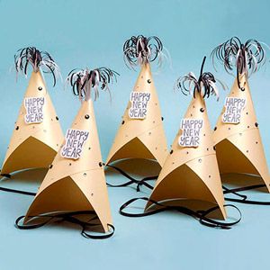 Paper Party Hats
DIY your own party hats this year with this glittery gold craf