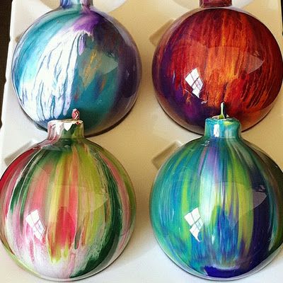 Put drops of acrylic paint inside clear bulbs, then shake. Great gift idea for t