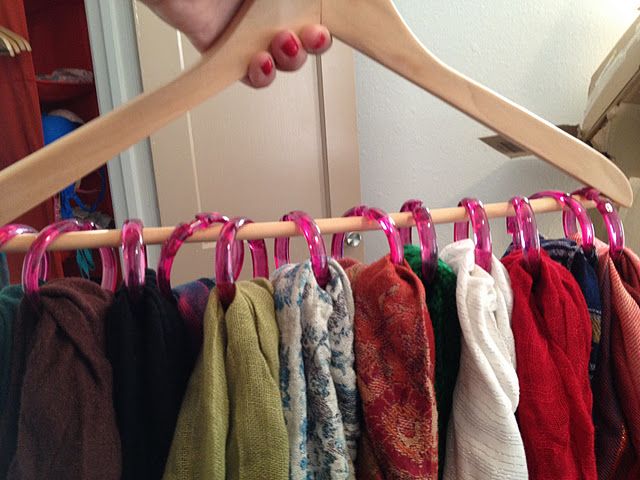 Put shower rings on a hanger to hold all of your scarves. CLEVER!