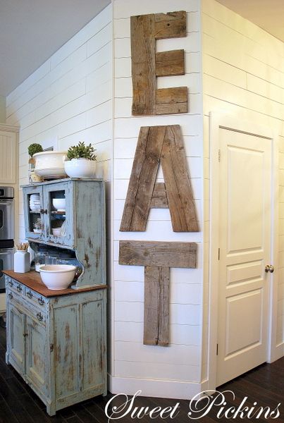Reclaimed wood kitchen sign good thing for some of the strange walls in my dinin