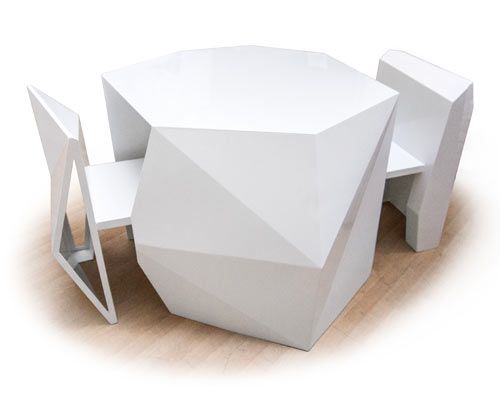 Sculptural Chairs Disappear Into Geometric Table