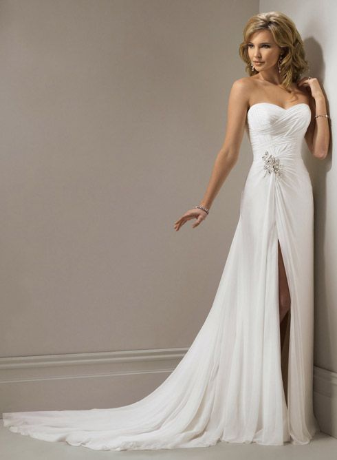 Strapless, slim line gown with sweetheart neckline and corset closure. This Goss