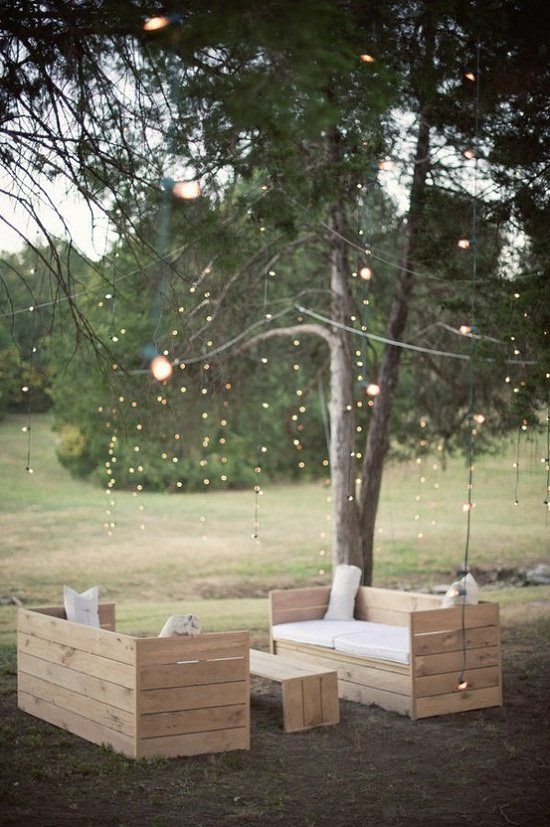 String lights dripping from the branches  Seating looks easy enough to make?