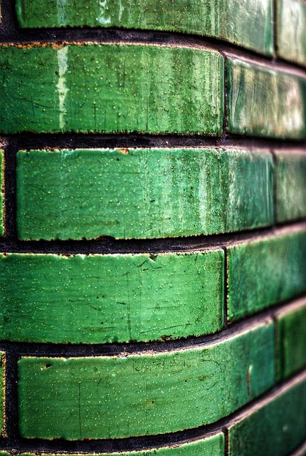 Such a striking alternative to traditional brick, in bright emerald green. would